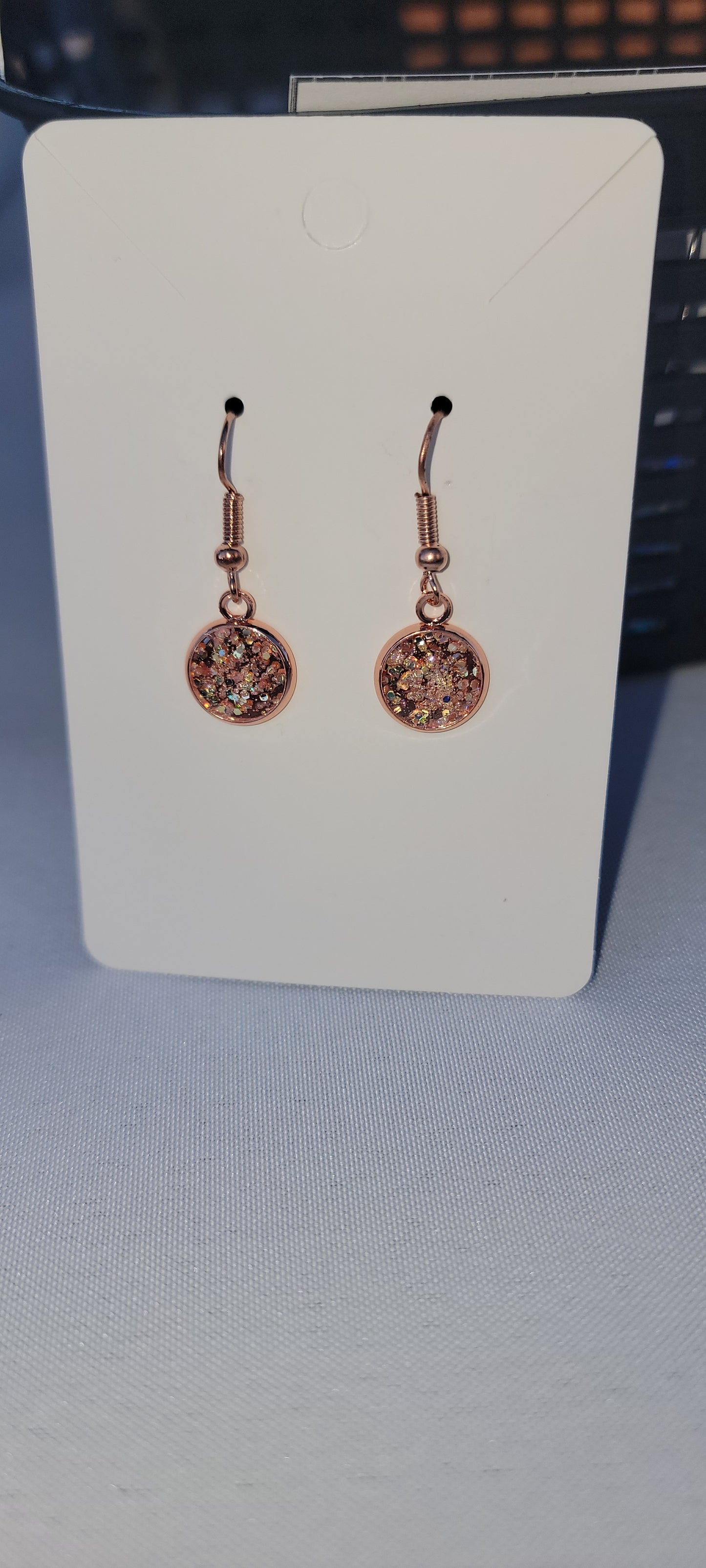 Small round dangle glitter earrings