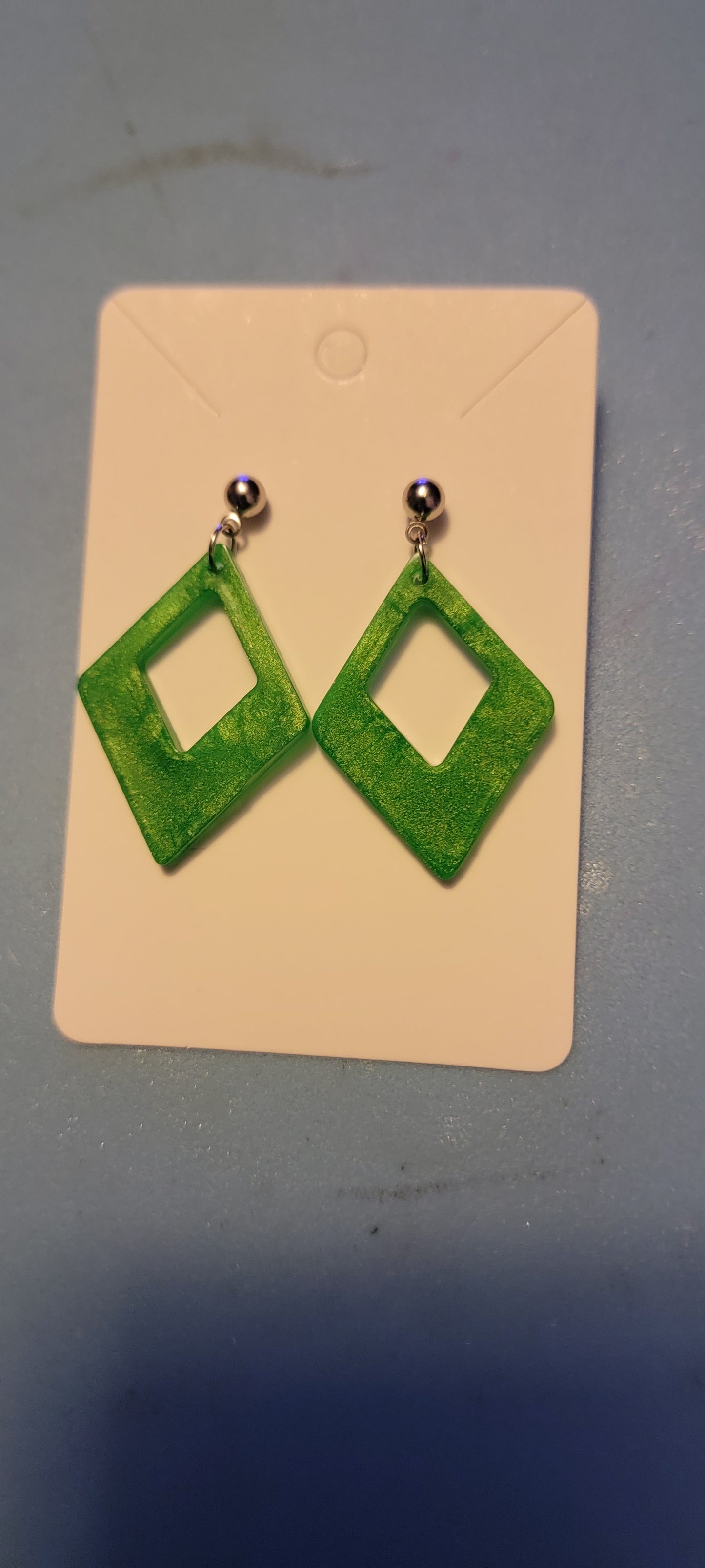 Green mica triangle resin earrings