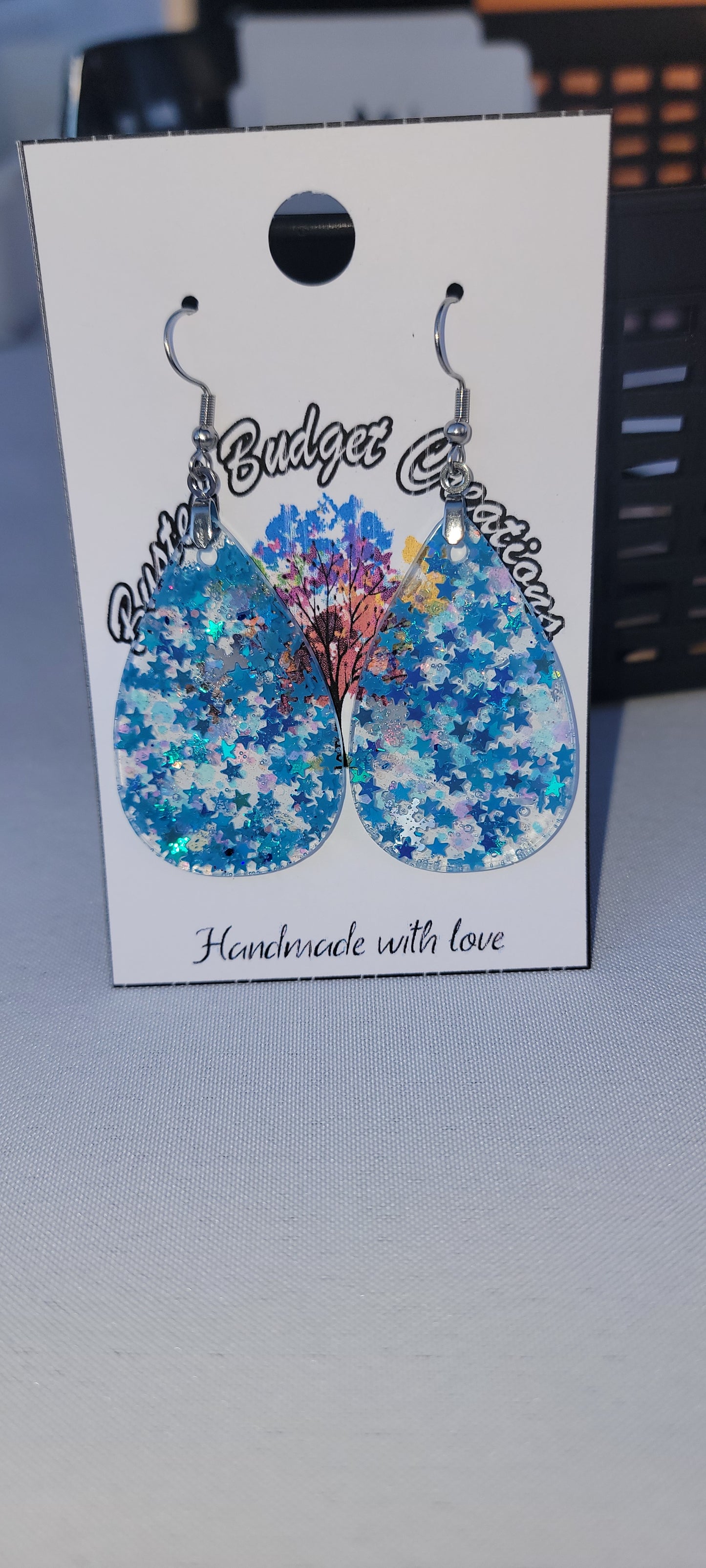 Blue star snow flake earrings